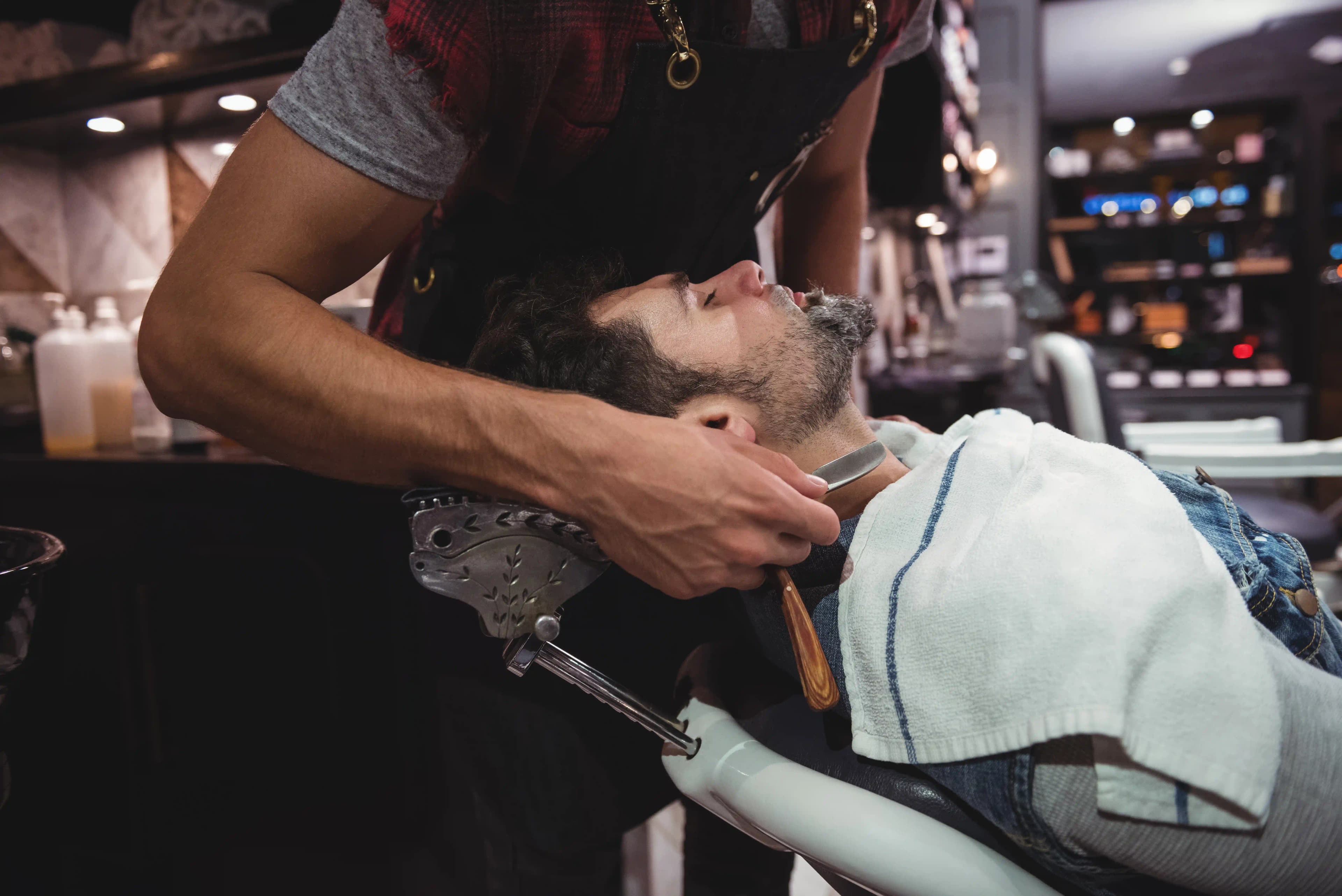 https://www.freepik.com/free-photo/man-getting-his-beard-shaved-with-razor_10518199.htm
