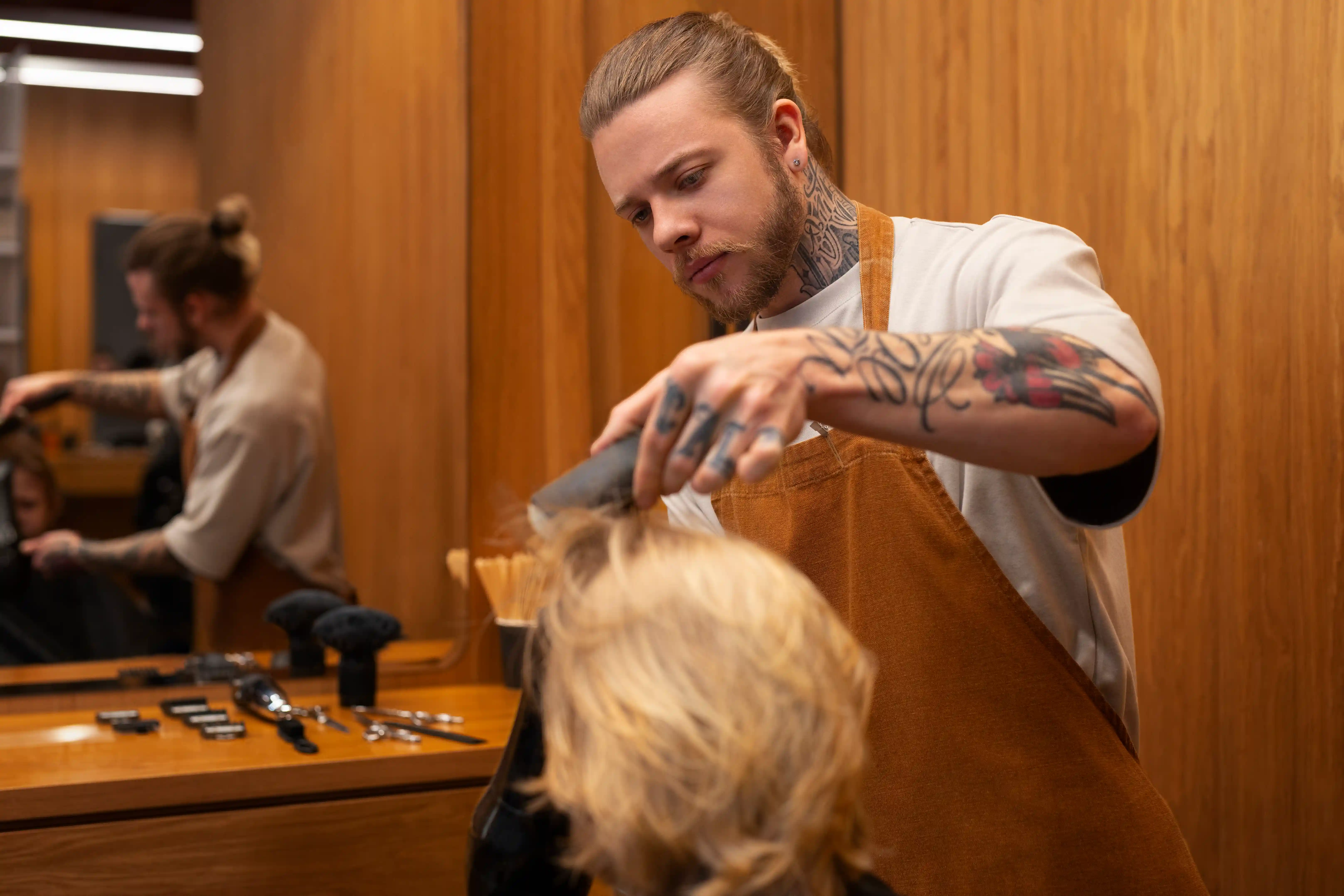 https://www.freepik.com/free-photo/child-getting-haircut-salon_44125772.htm