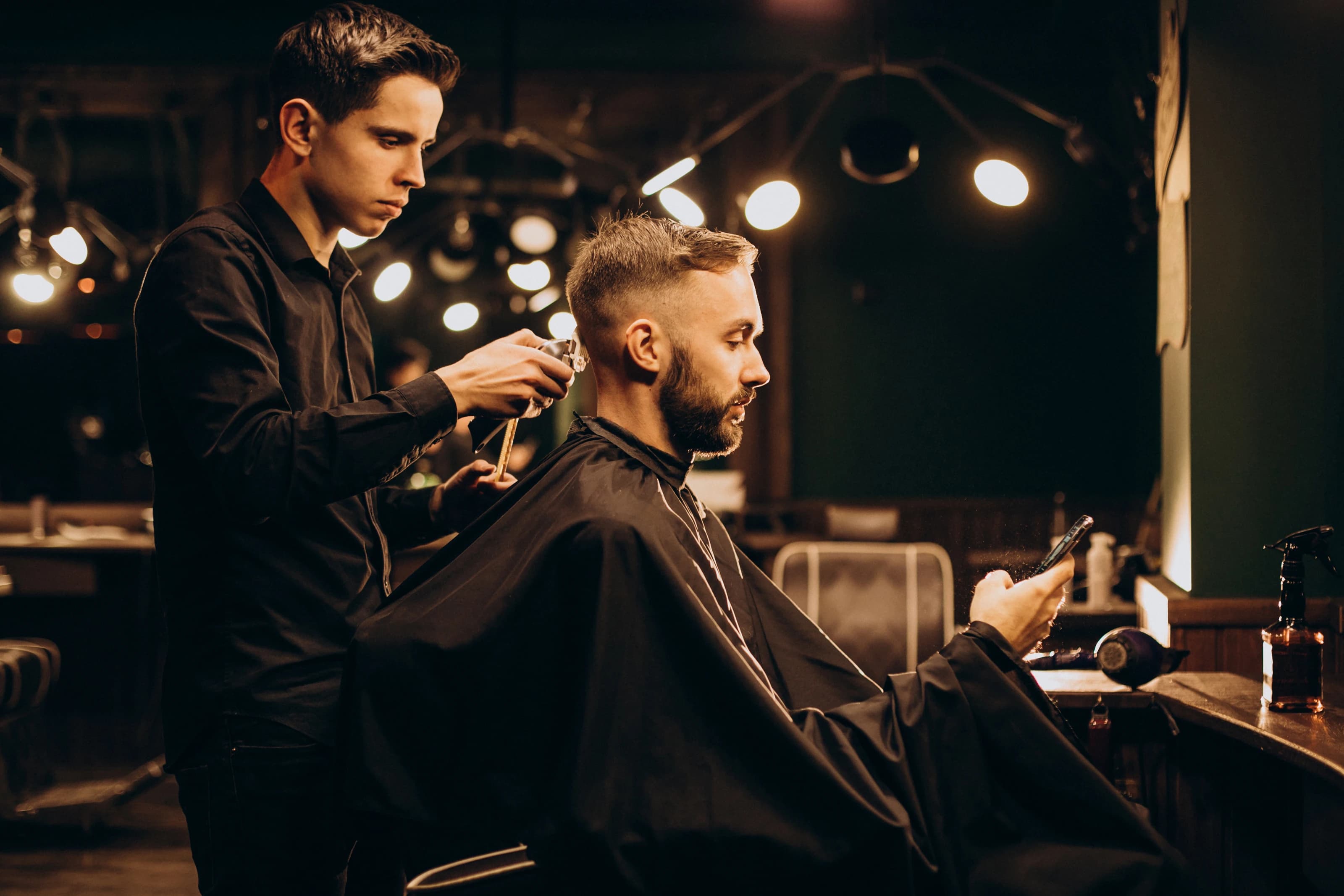 https://www.freepik.com/free-photo/young-man-barbershop-trimming-hair_12804098.htm